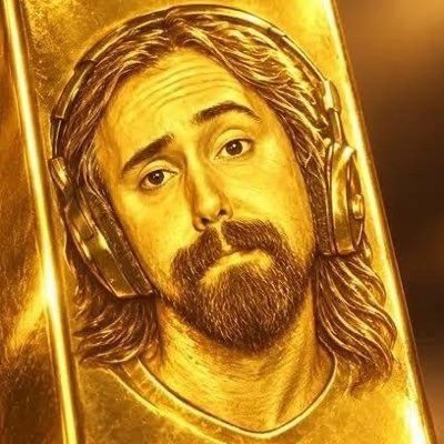ASMON community emblem — fan art of a face embossed on a gold bar